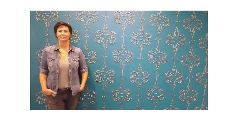Holly Ballard Martz and her wall installation, “Danger of Nostalgia in Wallpaper Form (in utero).” Holly Ballard Martz and her wall installation, “Danger of Nostalgia in Wallpaper Form (in utero).”